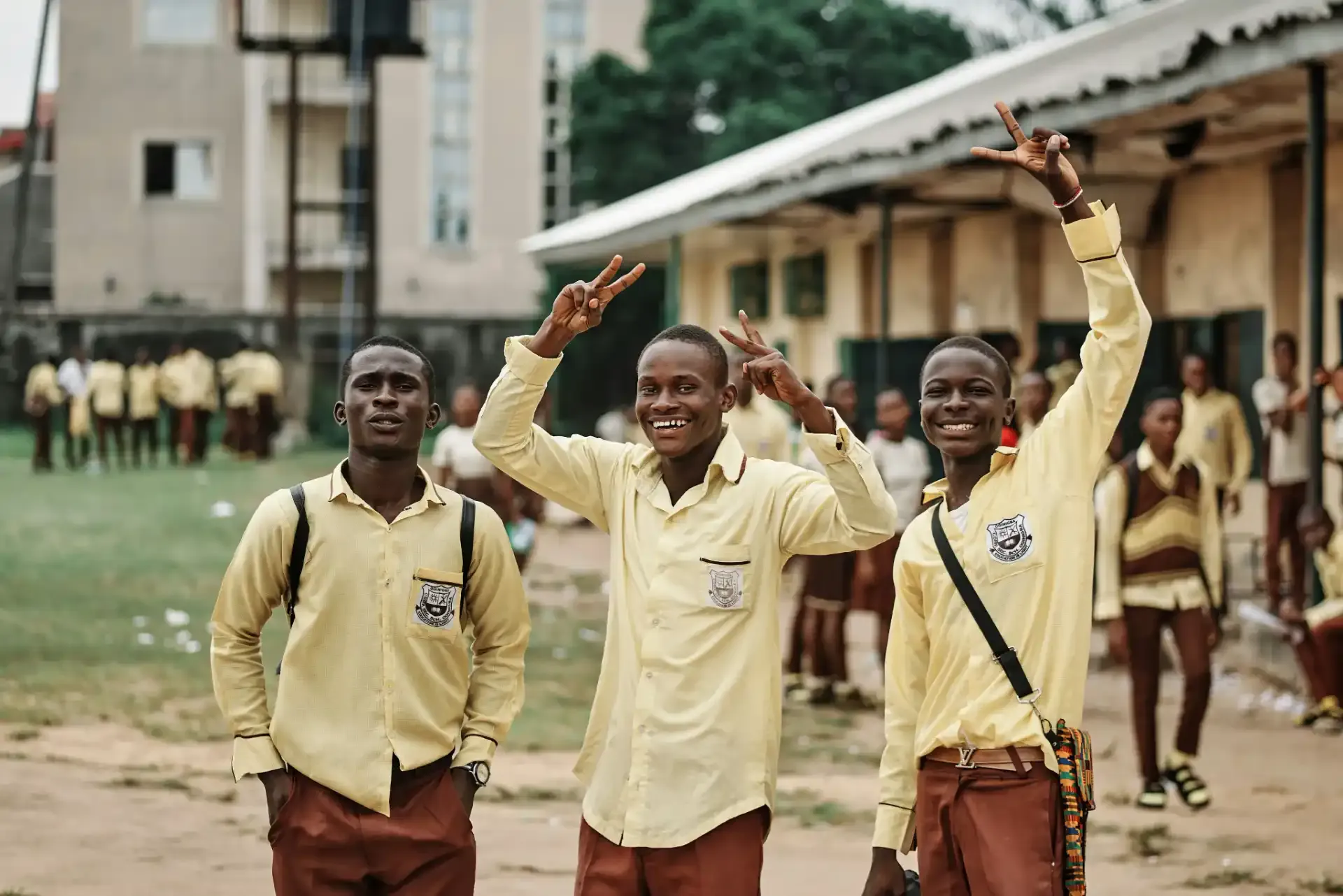 School children in uniforms celebrating