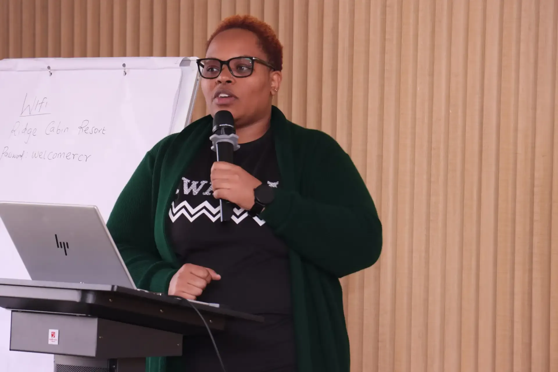 Woman speaking passionately at a community event